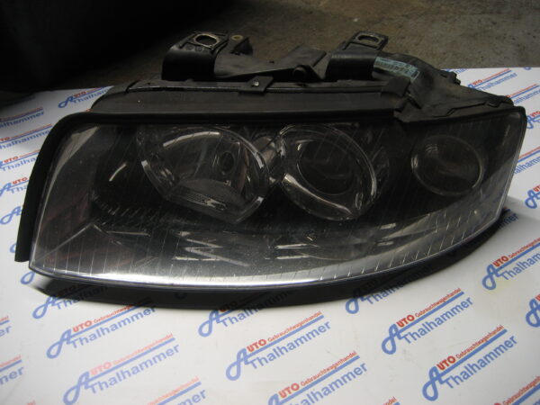 Scheinwerfer links 8E990007F